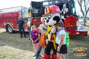 Kids with the fire safety mascot at the 2026 Yamboree